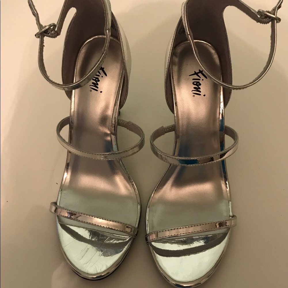 Never worn silver heels